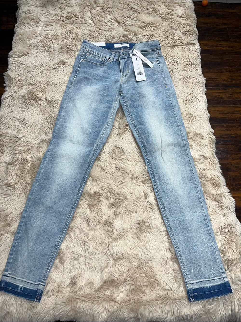 Light Blue Skinny Jeans with Subtle Fading - Women's
